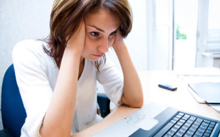 Frustrated-Woman-at-Computer-Negative-Google-Reviews